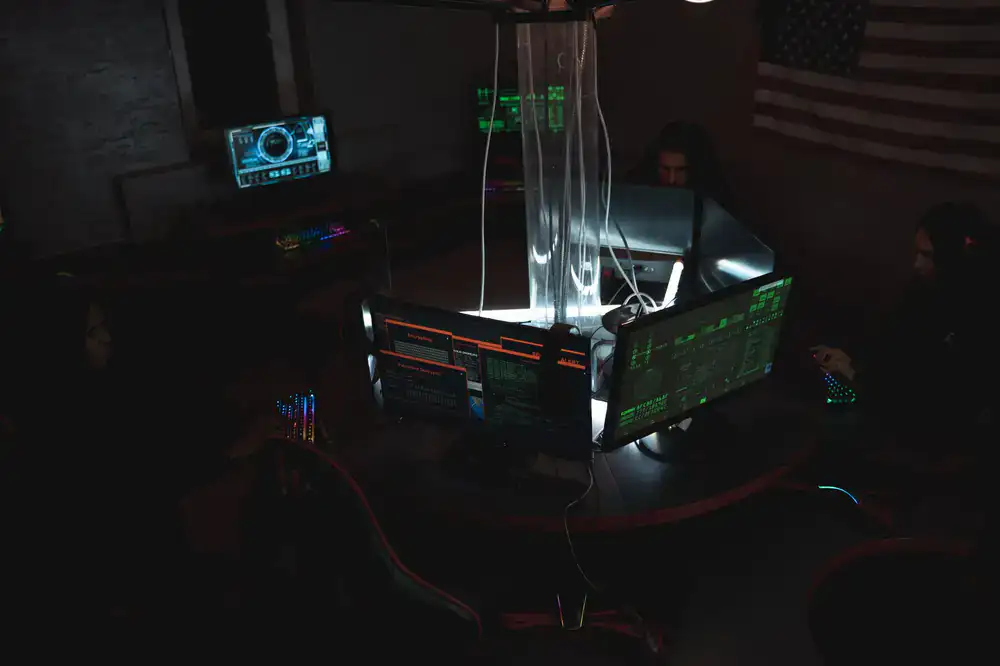 Game testing lab environment showing multiple monitors and hardware setups