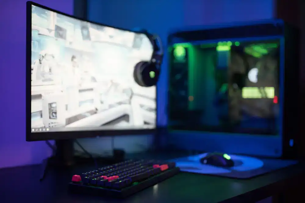 Various gaming consoles and diverse PC hardware setups in a testing lab