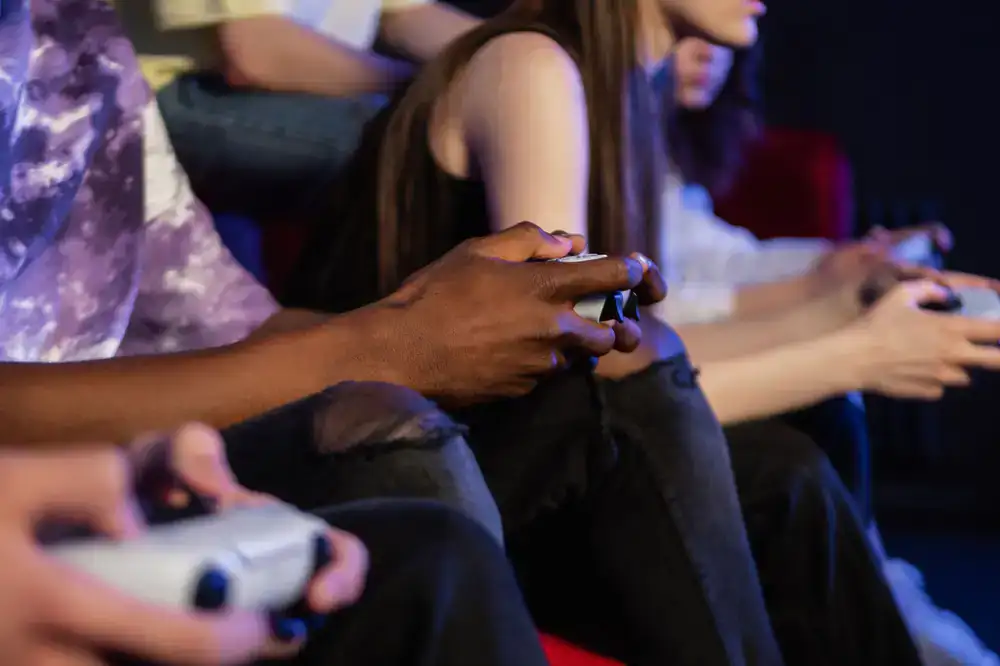 Group of diverse players testing a multiplayer game in a controlled lab